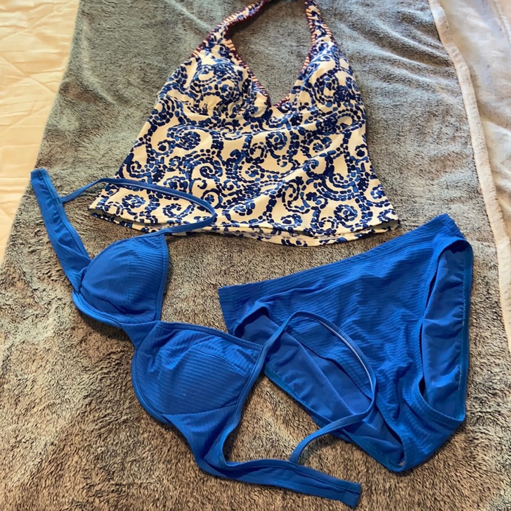 Three piece swim set w/solid blue bottoms & top with coordinating tankini top!